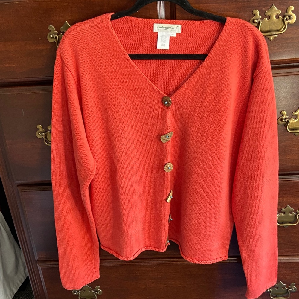 A Coldwater Cteek coat sweater with faux turquoise buttons.